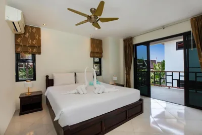 Apartamento de dos dormitorios con vistas parciales al océano — Baan Chom View Kamala